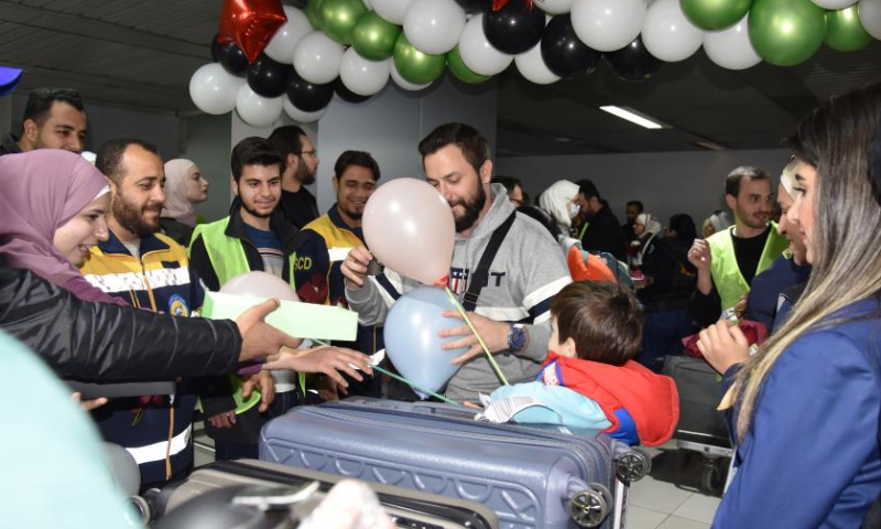 People from Doha of Qatar arrive at the Damascus International Airport, in Damascus, Syria, on Jan. 7, 2025. Damascus International Airport received its first civilian flight from Doha on Tuesday, marking the first arrival from Qatar in 13 years, according to airport officials. (Photo by Monsef Memari/Xinhua)