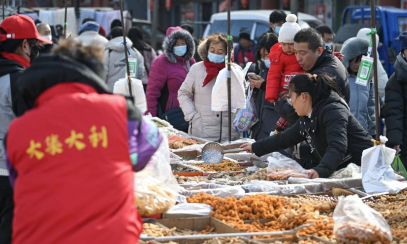 People visit an open-air market in Ninghe District of north China's Tianjin Municipality, Jan. 7, 2025. With a history of about 350 years, the market is one of the biggest countryside markets in Tianjin. (Xinhua/Sun Fanyue)