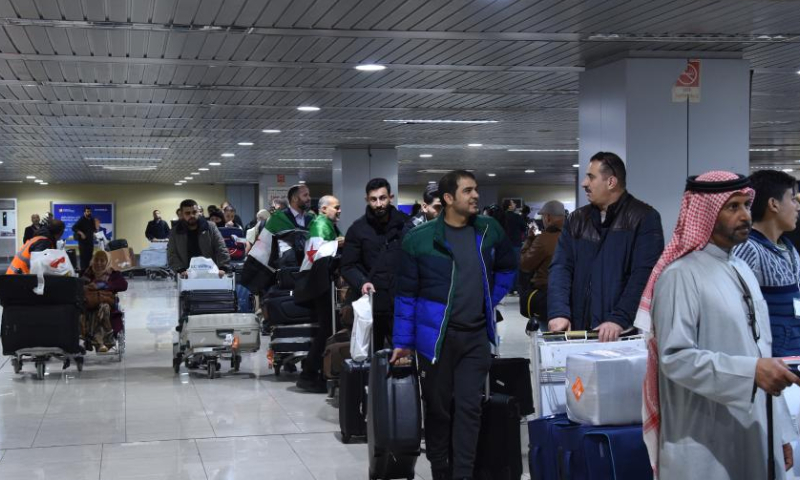 People from Doha of Qatar arrive at the Damascus International Airport, in Damascus, Syria, on Jan. 7, 2025. Damascus International Airport received its first civilian flight from Doha on Tuesday, marking the first arrival from Qatar in 13 years, according to airport officials. (Photo by Monsef Memari/Xinhua)