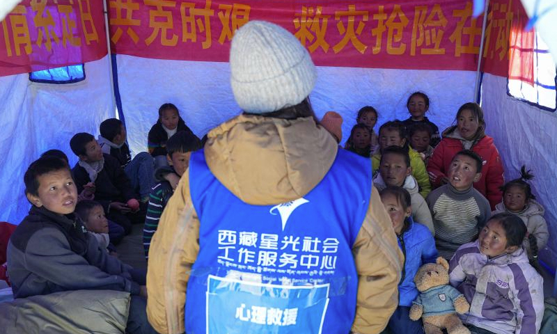 A staff member of social work service center provides psychological counseling for children at a resettlement site of quake-affected residents in a village in Dingri County in Xigaze, southwest China's Xizang Autonomous Region, Jan. 8, 2025.

The search-and-rescue effort has entered its final stage after a 6.8-magnitude earthquake struck Dingri County in southwest China's Xizang Autonomous Region on Tuesday morning, the regional government said on Wednesday.

The focus of work has shifted to the resettlement of quake-affected residents and post-disaster reconstruction, said Hong Li, head of the regional emergency management department at a press conference. (Xinhua/Jigme Dorje)