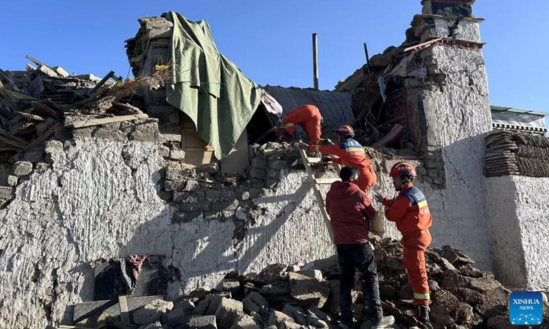 Rescuers work in an earthquake-affected area in Changsuo Township of Dingri in Xigaze, southwest China's Xizang Autonomous Region, Jan. 7, 2025. Thirty-two people have been confirmed dead and 38 injured during the 6.8-magnitude earthquake that jolted Dingri County in the city of Xigaze in Xizang Autonomous Region at 9:05 a.m. Tuesday (Beijing Time), according to regional disaster relief headquarters. (Xinhua)