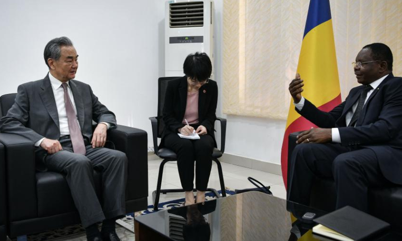 Chadian Prime Minister Allamaye Halina (1st R) meets with Chinese Foreign Minister Wang Yi (1st L), also a member of the Political Bureau of the Communist Party of China Central Committee, in N'Djamena, Chad, on Jan. 8, 2025. (Xinhua/Han Xu)