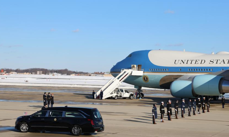 A presidential hearse carrying former U.S. President Jimmy Carter's coffin is seen at Joint Base Andrews in Maryland, the United States, on Jan. 7, 2025. The body of former U.S. President Jimmy Carter, who recently passed away at the age of 100, arrived in Washington, D.C. on Tuesday. A presidential jet departed from Atlanta, Georgia, earlier in the day and landed at Joint Base Andrews in Maryland, just outside the capital, Tuesday afternoon. (Xinhua/Hu Yousong)