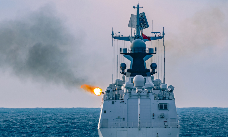 A Type 052D guided-missile destroyer attached to a flotilla under the Chinese PLA Navy fires its close-in weapon system at aerial targets during maritime training on November 11, 2024.  (eng.chinamil.com.cn/Photo by Wei Chenping)