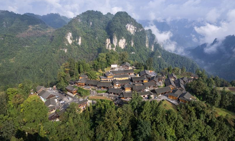 An aerial drone photo taken on Oct. 10, 2023 shows the view of Shibadong Village of Xiangxi Tujia and Miao Autonomous Prefecture, central China's Hunan Province. Seven villages in China have been honored as Best Tourism Villages by the United Nations World Tourism Organization (UN Tourism) in its 2024 selection, according to the Ministry of Culture and Tourism. (Xinhua/Chen Sihan)