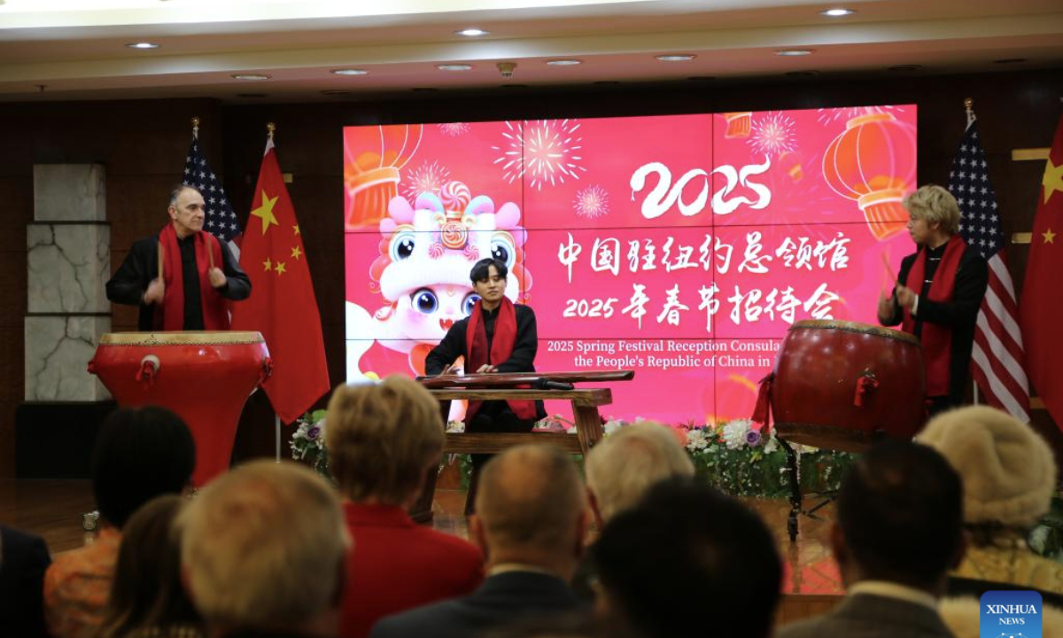 Artists play folk music during the 2025 Spring Festival reception at the Chinese Consulate General in New York, on Jan. 23, 2025. (Xinhua/Liu Yanan)