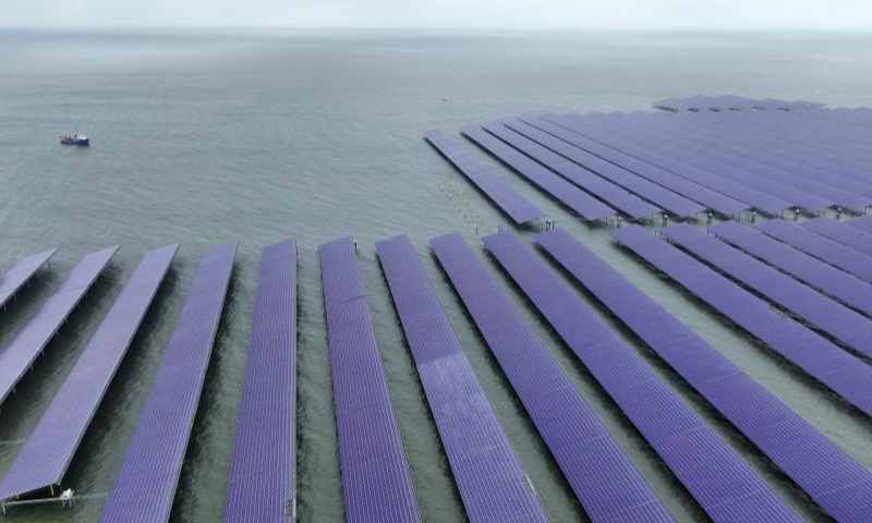 An aerial drone photo taken on Jan. 8, 2025 shows an offshore photovoltaic power project in the waters of Zhaoyuan City, east China's Shandong Province. Recently, data from Shandong branch of State Grid shows that the installed capacity of wind and photovoltaic power in Shandong has exceeded 100 million kilowatts. (Xinhua/Xu Suhui)