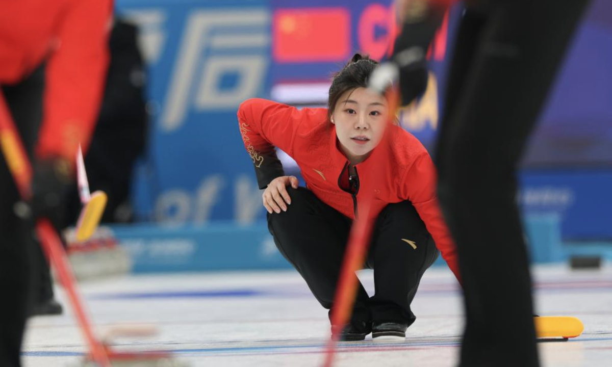 Dong Ziqi of China competes during the Women's Round Robin Session 1 match between China and Thailand of the curling event at the 9th Asian Winter Games in Harbin, northeast China's Heilongjiang Province, Feb. 9, 2025. (Xinhua/Hu Xingyu)