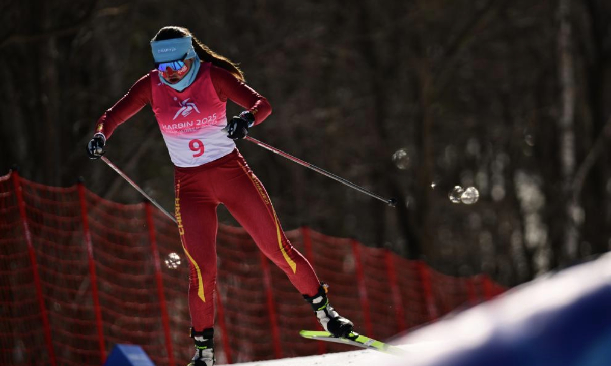 Bayani Jialin of China competes during the Cross-Country Skiing women's 5km free match at the 9th Asian Winter Games in Yabuli, northeast China's Heilongjiang Province, Feb. 9, 2025. (Xinhua/Zhang Long)