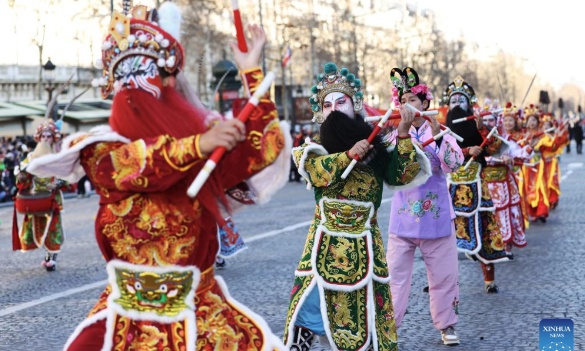 Members of a Yingge team perform Chaoyang Yingge dance during the Spring Festival celebration on the Champs-Elysees avenue in Paris, France, Feb. 2, 2025.

The Yingge dance, or dance to the hero's song, is a form of folk dance popular in south China's Guangdong Province and it was listed as the first batch of China's national intangible cultural heritage in 2006. (Xinhua/Gao Jing)