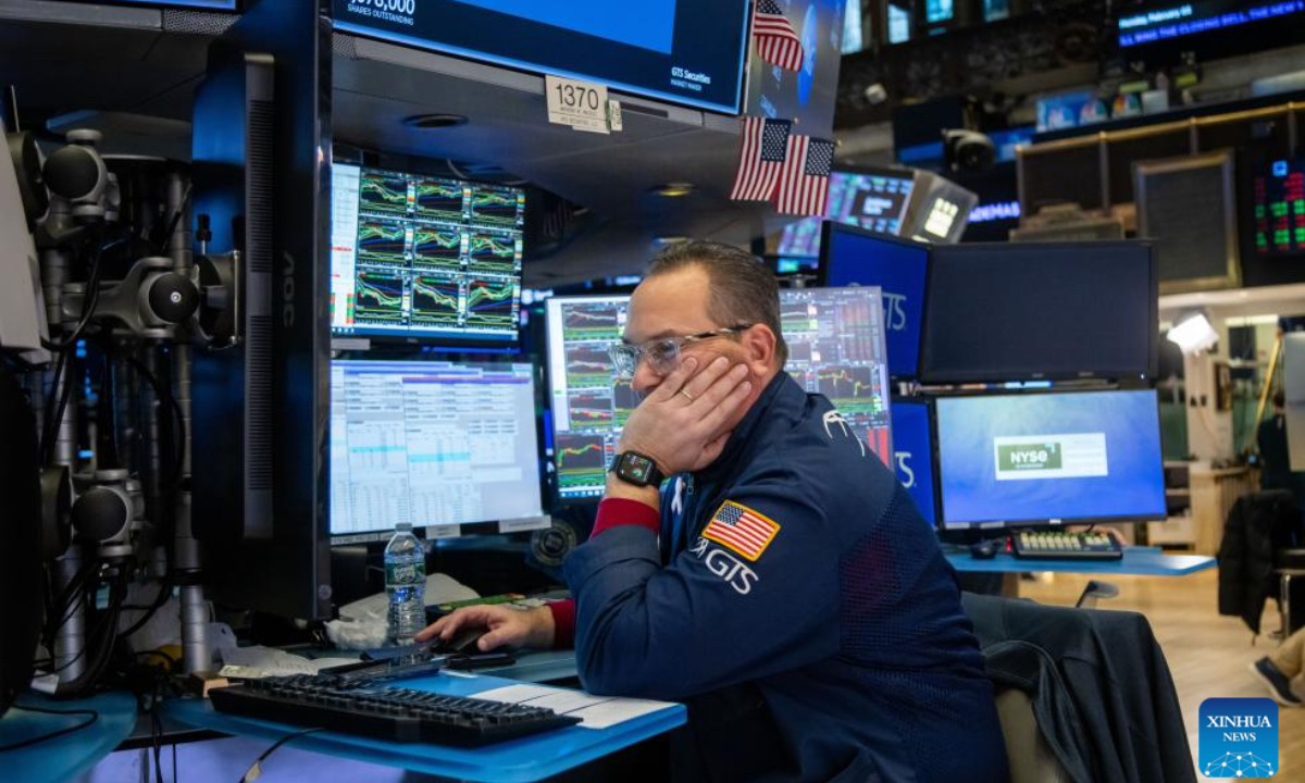 A trader works on the floor of the New York Stock Exchange in New York, the United States, on Feb. 3, 2025. U.S. stocks ended lower on Monday, as investors reacted to the Donald Trump administration's planned tariff rollout. The Dow Jones Industrial Average fell 122.75 points, or 0.28 percent, to 44,421.91. The S&P 500 sank 45.96 points, or 0.76 percent, to 5,994.57. The Nasdaq Composite Index shed 235.49 points, or 1.20 percent, to 19,391.96. (Photo by Michael Nagle/Xinhua)