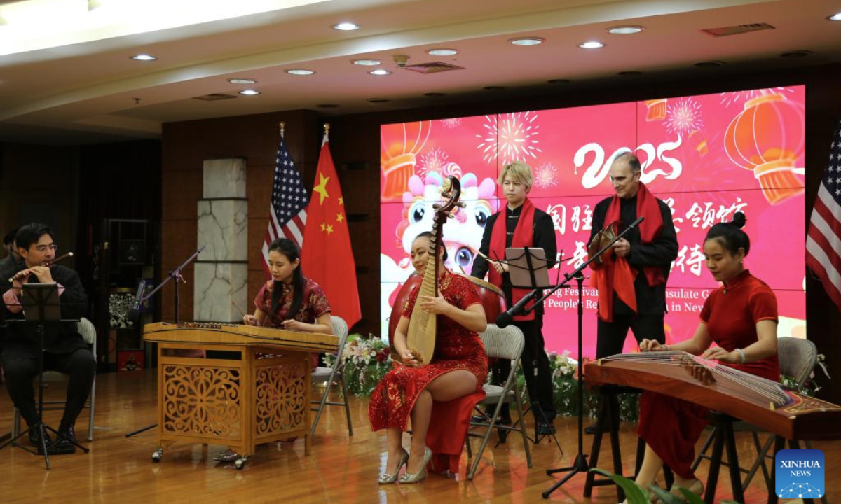 Artists play folk music during the 2025 Spring Festival reception at the Chinese Consulate General in New York, on Jan. 23, 2025. (Xinhua/Liu Yanan)