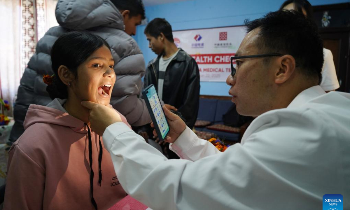 Chinese medical team conducts free check