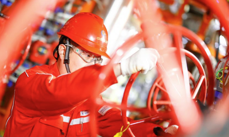 A worker operates at an offshore production platform of the first phase of Bozhong 26-6 oilfield in China's Bohai Sea, Feb. 8, 2025. The first phase of Bozhong 26-6 oilfield, by far the largest metamorphic rock oilfield in the world, commenced production on Friday, according to its developer, the China National Offshore Oil Corporation (CNOOC) Tianjin branch.

The Bozhong 26-6 oilfield is located in the Bohai Sea, about 170 km from north China's Tianjin Municipality, with an average water depth of about 20 meters. Discovered in 2022, its cumulative proven oil and gas reserves has exceeded 200 million cubic meters. (Photo by Du Penghui/Xinhua)