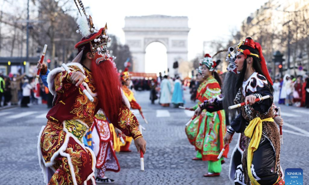 Members of a Yingge team perform Chaoyang Yingge dance during the Spring Festival celebration on the Champs-Elysees avenue in Paris, France, Feb. 2, 2025.

The Yingge dance, or dance to the hero's song, is a form of folk dance popular in south China's Guangdong Province and it was listed as the first batch of China's national intangible cultural heritage in 2006. (Xinhua/Gao Jing)