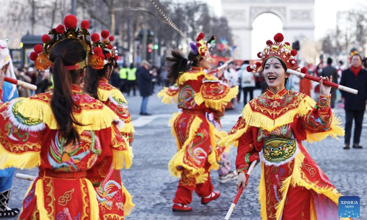 Members of a Yingge team perform Chaoyang Yingge dance during the Spring Festival celebration on the Champs-Elysees avenue in Paris, France, Feb. 2, 2025.

The Yingge dance, or dance to the hero's song, is a form of folk dance popular in south China's Guangdong Province and it was listed as the first batch of China's national intangible cultural heritage in 2006. (Xinhua/Gao Jing)