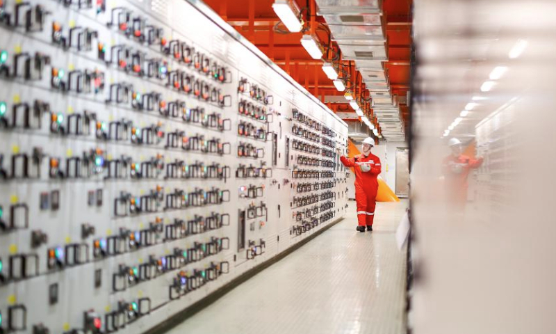 A worker checks the power supply system at an offshore production platform of the first phase of Bozhong 26-6 oilfield in China's Bohai Sea, Feb. 8, 2025. The first phase of Bozhong 26-6 oilfield, by far the largest metamorphic rock oilfield in the world, commenced production on Friday, according to its developer, the China National Offshore Oil Corporation (CNOOC) Tianjin branch.

The Bozhong 26-6 oilfield is located in the Bohai Sea, about 170 km from north China's Tianjin Municipality, with an average water depth of about 20 meters. Discovered in 2022, its cumulative proven oil and gas reserves has exceeded 200 million cubic meters. (Photo by Du Penghui/Xinhua)