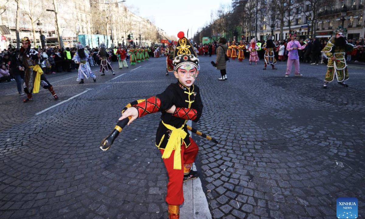 Members of Yingge team perform Chaoyang Yingge dance during Spring Festival celebration in Paris