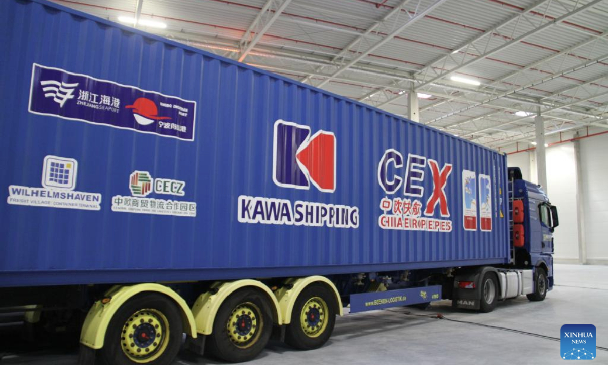 Photo taken on Jan. 24, 2025 shows a container printed with the China-Europe Express in Wilhelmshaven, Germany. The first container ship of the China-Europe Express, the fastest direct route connecting Europe and China's Yangtze River Delta region, arrived at its destination at the Jade Weser Port in Wilhelmshaven on Friday. The KAWA Ningbo cargo ship, carrying over 1700 containers of new-energy and other high-value goods, completed its non-stop voyage in 26 days, well below the shipment time of 45 days in the past. (Xinhua/Shan Weiyi)