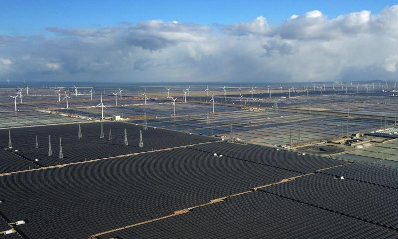 An aerial drone photo taken on Jan. 8, 2025 shows a salt-photovoltaic complementary power project in Laizhou City, east China's Shandong Province. Recently, data from Shandong branch of State Grid shows that the installed capacity of wind and photovoltaic power in Shandong has exceeded 100 million kilowatts. (Xinhua/Xu Suhui)