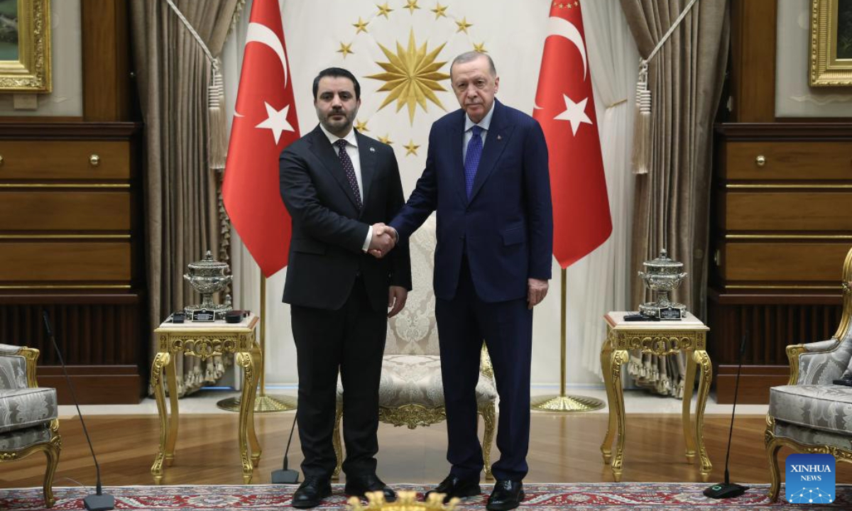 Turkish President Recep Tayyip Erdogan (R) shakes hands with Syria's interim Foreign Minister Asaad Al-Shaibani during their meeting in Ankara, Türkiye, on Jan. 15, 2025. Syria's interim Foreign Minister Asaad Al-Shaibani met with Turkish President Recep Tayyip Erdogan and Foreign Minister Hakan Fidan on Wednesday on his first official visit to Türkiye. (Mustafa Kaya/Handout via Xinhua)