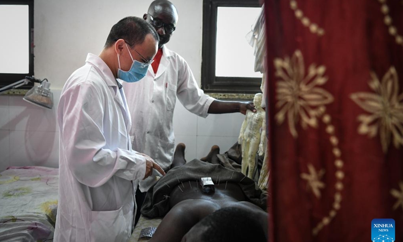 Chinese doctor Xie Nengxiang, a member of the 20th Chinese medical team to Chad, performs acupuncture treatment for a patient at the China-Chad Friendship Hospital in N'Djamena, Chad, Jan. 9, 2025.