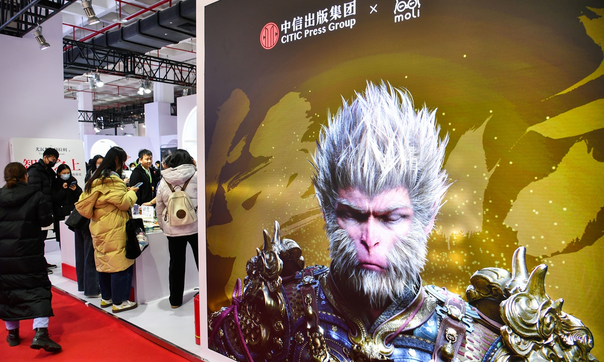 Visitors explore books related to the video game Black Myth: Wukong at the Beijing Book Fair on January 10, 2025. Photo: VCG