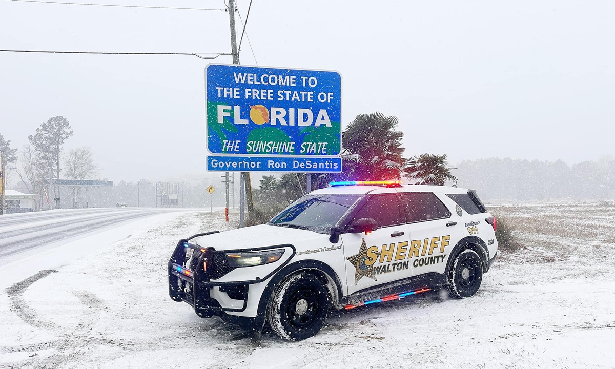 Rare winter storm hits southern US while LA fights new wildfire, igniting climate change debate