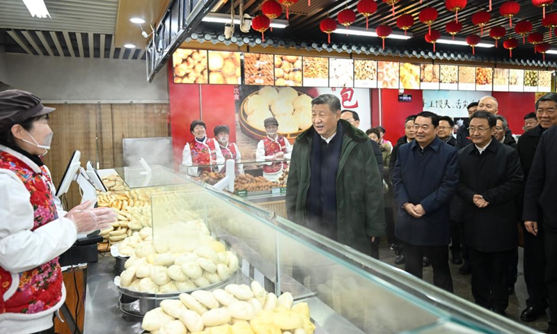 Xi's visits to base ahead of Spring Festival reflect 'people first' philosophy