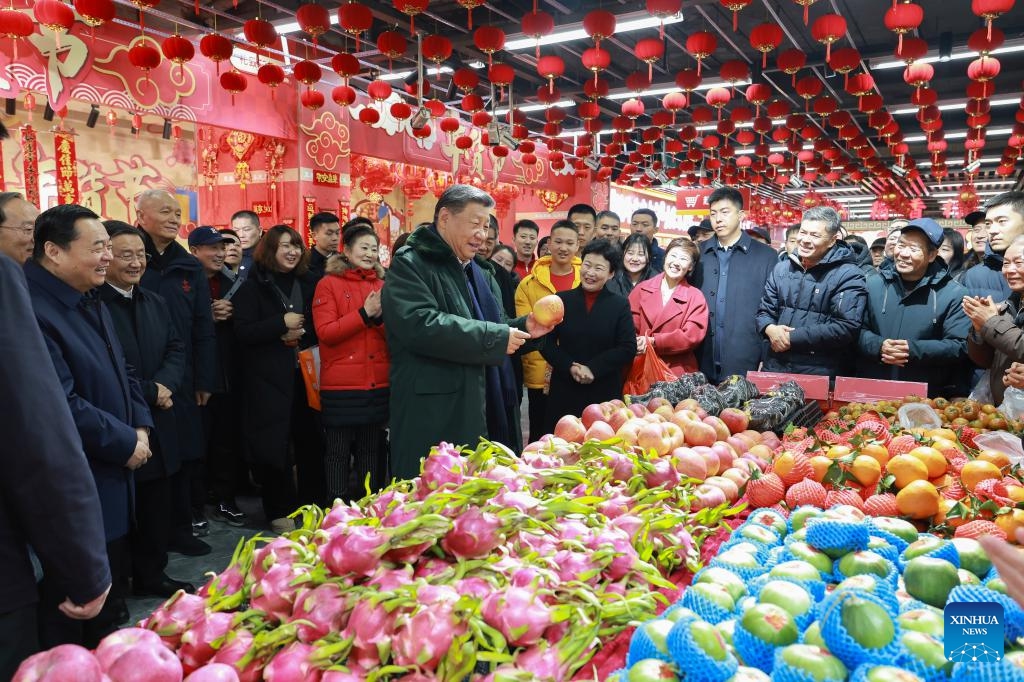 Chinese President Xi Jinping, also general secretary of the Communist Party of China Central Committee and chairman of the Central Military Commission, learns about the supply of goods during the holiday season and measures in place to meet residents' daily needs while visiting a food market in Shenyang, capital city of northeast China's Liaoning Province, Jan. 23, 2025. Xi on Thursday inspected Shenyang. (Xinhua/Wang Ye)