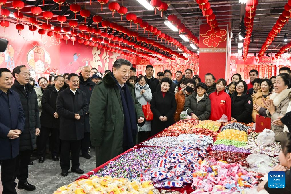 Chinese President Xi Jinping, also general secretary of the Communist Party of China Central Committee and chairman of the Central Military Commission, learns about the supply of goods during the holiday season and measures in place to meet residents' daily needs while visiting a food market in Shenyang, capital city of northeast China's Liaoning Province, Jan. 23, 2025. Xi on Thursday inspected Shenyang. (Xinhua/Xie Huanchi)