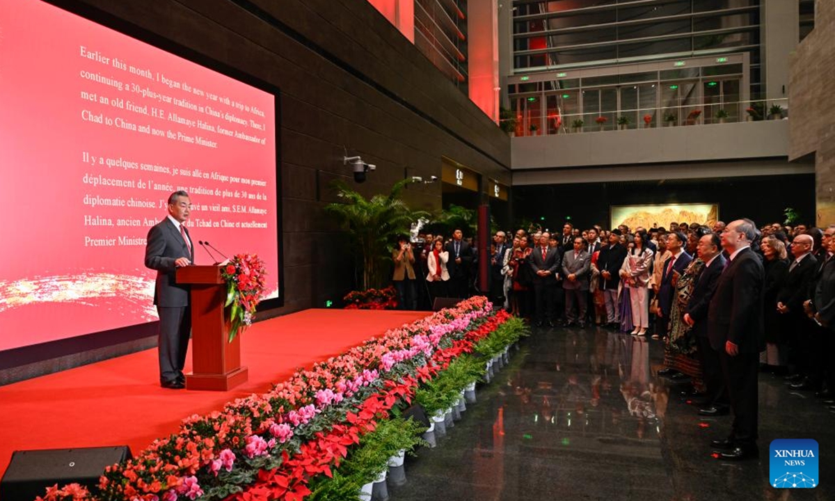 Chinese Foreign Minister Wang Yi, also a member of the Political Bureau of the Communist Party of China Central Committee, hosts the Chinese Foreign Ministry's 2025 New Year reception at the Beijing Performing Arts Center in Beijing, capital of China, Jan. 24, 2025. (Xinhua/Yin Bogu)