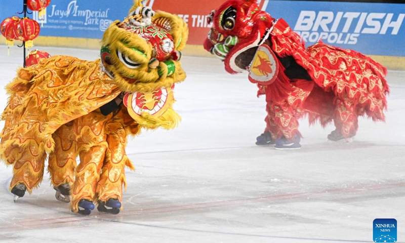 Lion dancers perform on ice to celebrate the upcoming Chinese Lunar New Year, or the Spring Festival, at Bintaro Exchange Mall in South Tangerang, Banten Province, Indonesia, Jan. 25, 2025. (Xinhua/Agung Kuncahya B.)