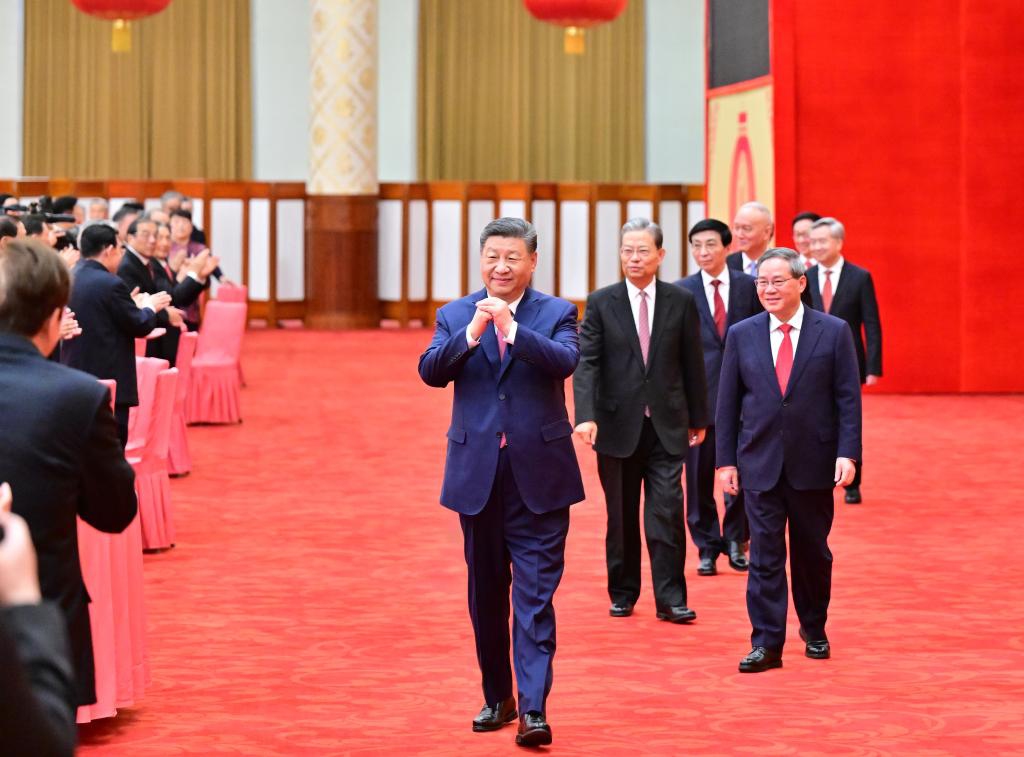 Chinese President Xi Jinping, also general secretary of the Communist Party of China (CPC) Central Committee and chairman of the Central Military Commission, gestures as he attends a high-level reception to ring in the Chinese New Year at the Great Hall of the People in Beijing, capital of China, Jan. 27, 2025. The CPC Central Committee and the State Council held the reception on Monday in Beijing. (Xinhua/Zhai Jianlan)