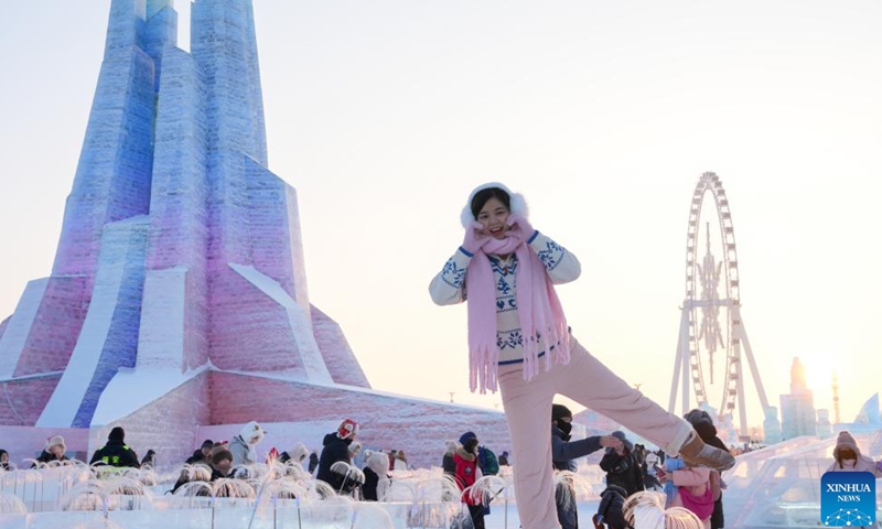 A tourist poses for photos at the Harbin Ice-Snow World in Harbin, northeast China's Heilongjiang Province, Jan. 23, 2025.

As of 10 p.m. Sunday, the bustling Harbin Ice-Snow World had received more than 2 million visitors since it opened on Dec. 21, 2024.

As the city's iconic landmark, the Harbin Ice-Snow World, with this year's edition, the largest in its history, boasts 1 million square meters, up from last year's 800,000 square meters. More than 300,000 cubic meters of ice and snow were used in its construction. (Xinhua/Wang Jianwei)