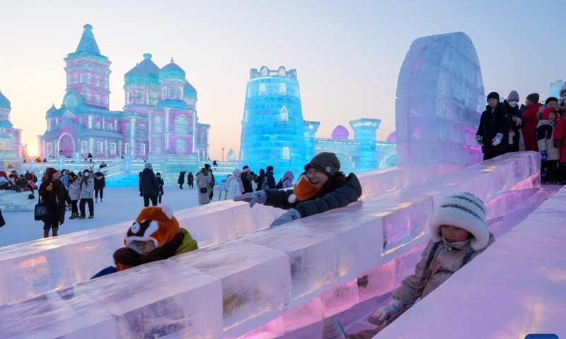 People experience ice slide at the Harbin Ice-Snow World in Harbin, northeast China's Heilongjiang Province, Jan. 23, 2025.

As of 10 p.m. Sunday, the bustling Harbin Ice-Snow World had received more than 2 million visitors since it opened on Dec. 21, 2024.

As the city's iconic landmark, the Harbin Ice-Snow World, with this year's edition, the largest in its history, boasts 1 million square meters, up from last year's 800,000 square meters. More than 300,000 cubic meters of ice and snow were used in its construction. (Xinhua/Wang Jianwei)