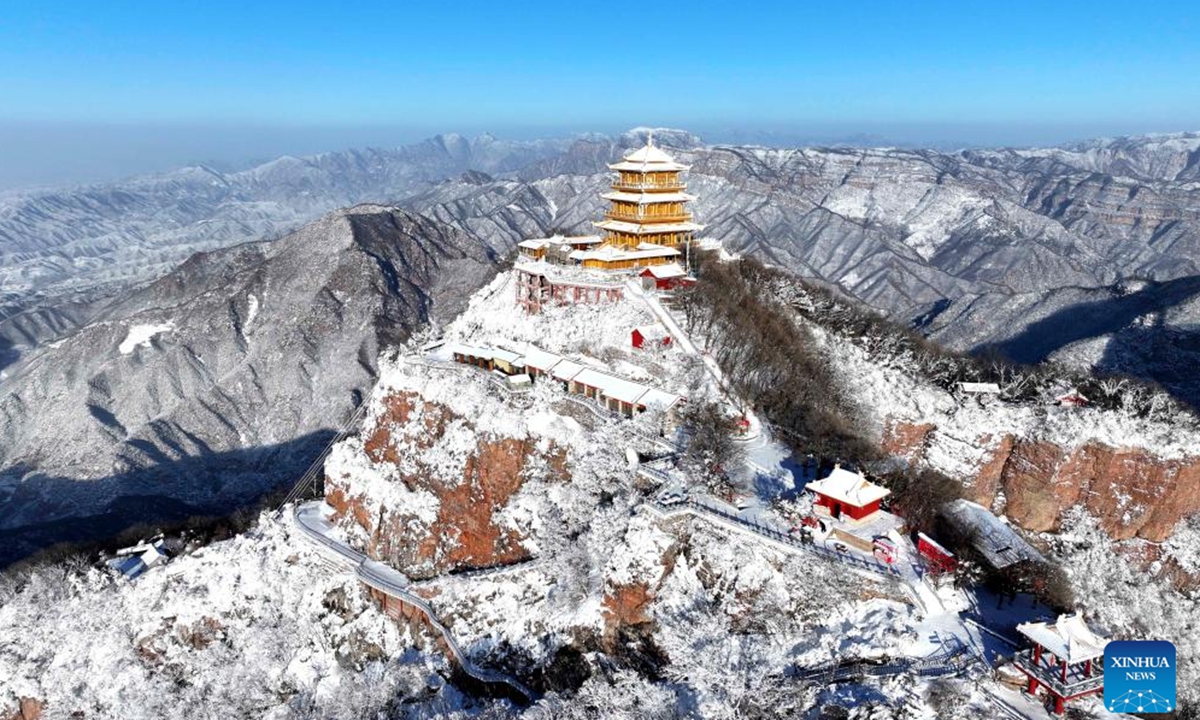 An aerial drone photo shows the snow scenery of the Wangwu Mountain scenic spot in Jiyuan City, central China's Henan Province, Jan. 26, 2025. (Photo by Duan Erping/Xinhua)

