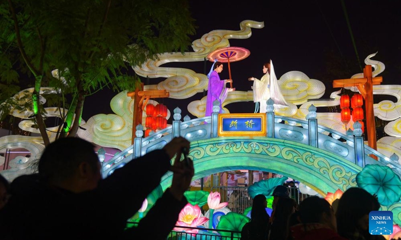 Tourists visit the 31st Zigong International Dinosaur Lantern Show in Zigong, southwest China's Sichuan Province, Jan. 17, 2025. The national-level intangible cultural heritage project Zigong lantern show boasts a long history, as it can be traced back to the Tang (618-907) and Song (960-1279) dynasties. In 1964, Zigong held the first lantern show celebrating the Spring Festival. So far, making colorful lanterns has become a popular industry here, with Zigong lanterns having been displayed in more than 80 countries and regions. Making a Zigong lantern involves many craftsmen, including art designers, bench workers, mechanics, electricians and paperhanging workers. The complete process can hardly be found in other places in China. Photo: Xinhua