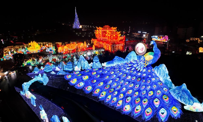 A drone photo shows light installations at the 31st Zigong International Dinosaur Lantern Show in Zigong, southwest China's Sichuan Province, Jan. 17, 2025. The national-level intangible cultural heritage project Zigong lantern show boasts a long history, as it can be traced back to the Tang (618-907) and Song (960-1279) dynasties. In 1964, Zigong held the first lantern show celebrating the Spring Festival. So far, making colorful lanterns has become a popular industry here, with Zigong lanterns having been displayed in more than 80 countries and regions. Making a Zigong lantern involves many craftsmen, including art designers, bench workers, mechanics, electricians and paperhanging workers. The complete process can hardly be found in other places in China. Photo: Xinhua