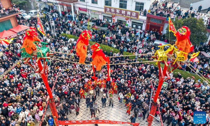 A drone photo shows folk artists performing lion dance in the air in Tule Village of Yuxiang Town in Yongji City, north China's Shanxi Province, Jan. 29, 2025. Various events were held across China on Wednesday to celebrate the Spring Festival. Photo: Xinhua