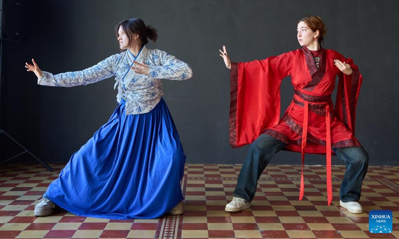 Participants learn Baduanjin, a traditional form of Chinese aerobic exercise, during an event in celebration of the Chinese New Year at the Confucius Institute of Far Eastern Federal University of Russia, in Vladivostok, Russia, Jan. 29, 2025. The Confucius Institute of Far Eastern Federal University of Russia hosted a Chinese New Year cultural experience event, attracting many participants. Photo: Xinhua