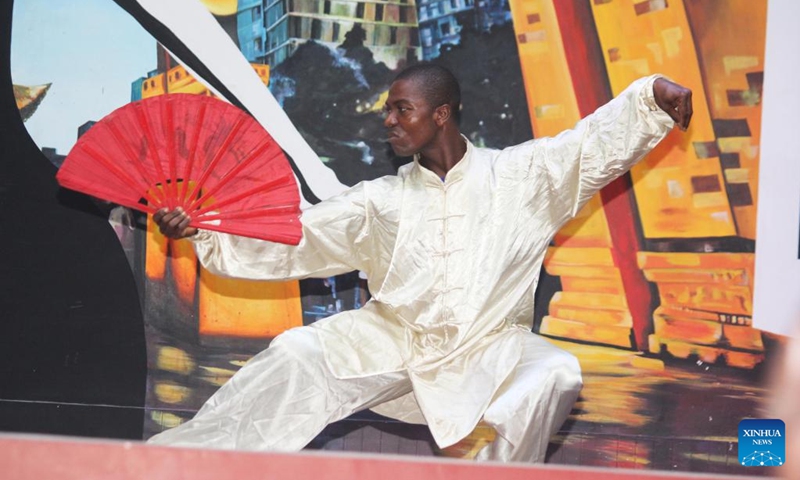 A local martial arts lover performs during a Spring Festival gala at the Chinese Cultural Center in Cotonou, Benin, Jan. 25, 2025. The 2025 Happy Chinese New Year celebrations kicked off here recently, which will last till Feb. 12.  Photo: Xinhua