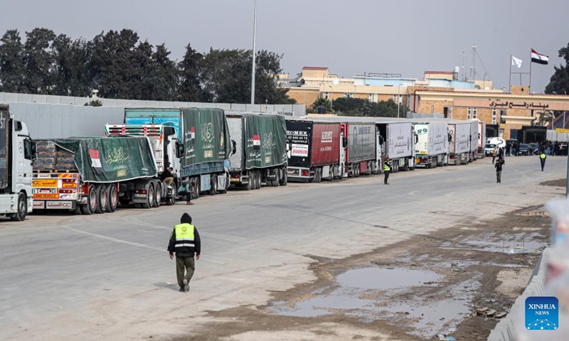 Aid trucks wait to enter Gaza on the Egyptian side of the Rafah crossing on Jan. 28, 2025. Photo: Xinhua