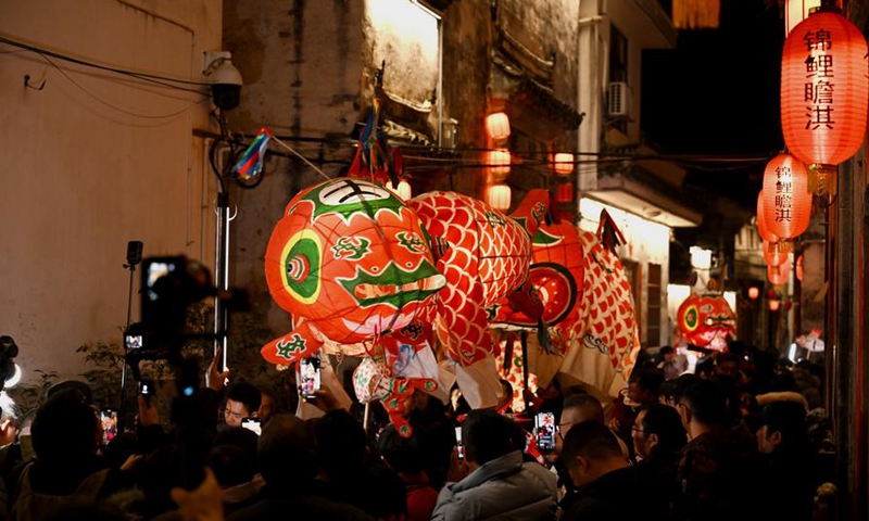 A fish-shaped lantern performing team parades at Zhanqi Village in Shexian County of Huangshan City, east China's Anhui Province, Jan. 8, 2025. Photo: Xinhua