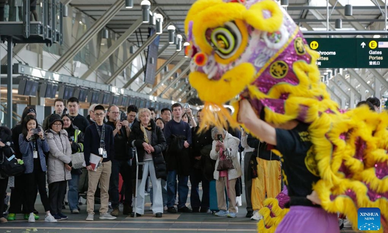 People watch a lion dance performance during the Chinese New Year celebration in the departure hall of Vancouver International Airport in Richmond, British Columbia, Canada, on Jan. 29, 2025.  Photo: Xinhua