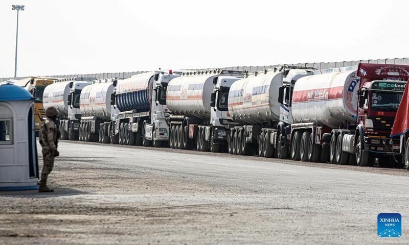 Aid trucks wait to enter Gaza on the Egyptian side of the Rafah crossing on Jan. 28, 2025. Photo: Xinhua