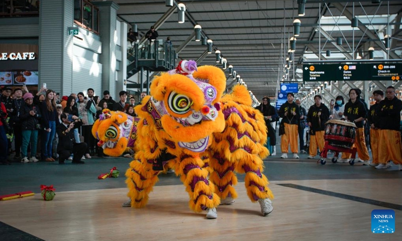 People watch a lion dance performance during the Chinese New Year celebration in the departure hall of Vancouver International Airport in Richmond, British Columbia, Canada, on Jan. 29, 2025. Photo: Xinhua