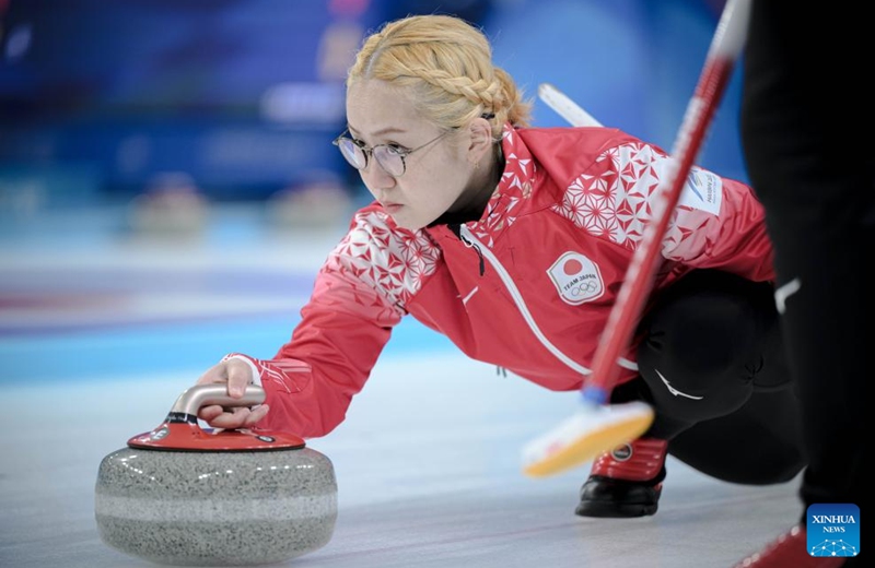 Koana Tori of Japan competes during the mixed doubles Round Robin Session 1 match between Koana Tori/Aoki Go of Japan and Chanatip Sonkham/Teekawin Jearateerawit of Thailand in the curling event at 2025 Asian Winter Games in Harbin, northeast China's Heilongjiang Province, Feb. 4, 2025. Photo: Xinhua