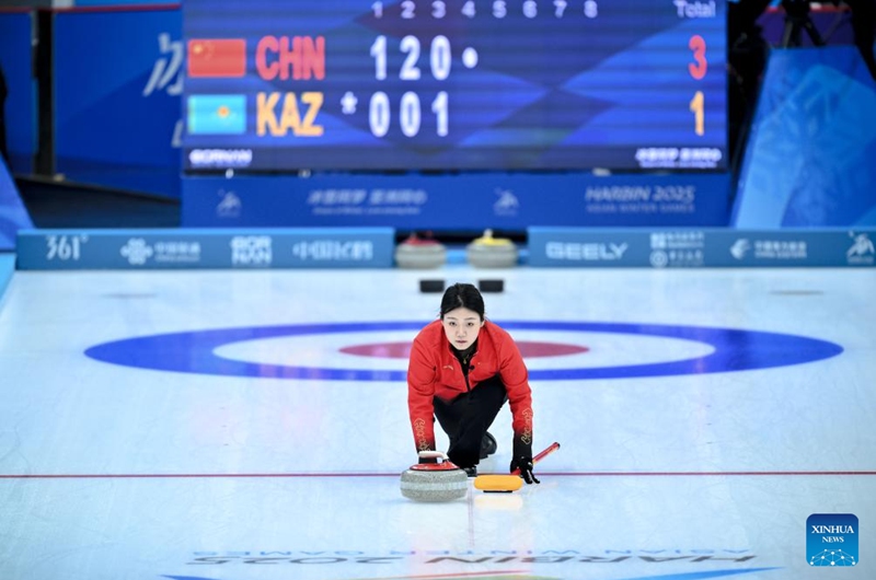 Han Yu of China competes during the mixed doubles Round Robin Session 1 match between Amina Seitzhanova/Azizbek Nadirbayev of Kazakhstan and Han Yu/Wang Zhiyu of China in the curling event at 2025 Asian Winter Games in Harbin, northeast China's Heilongjiang Province, Feb. 4, 2025. Photo: Xinhua