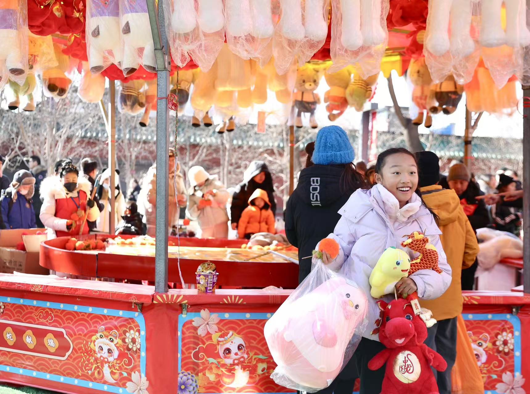 Three generations born in the Year of the Snake celebrate the Spring Festival